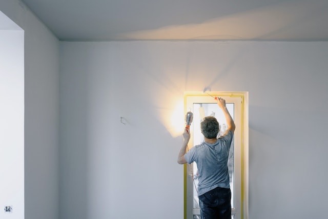 repairing-a-door-with-a-screwdriver-and-a-light